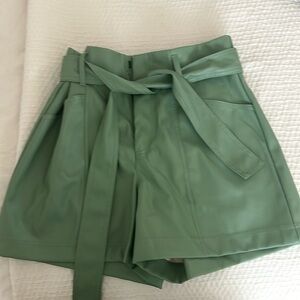 Green leather shorts